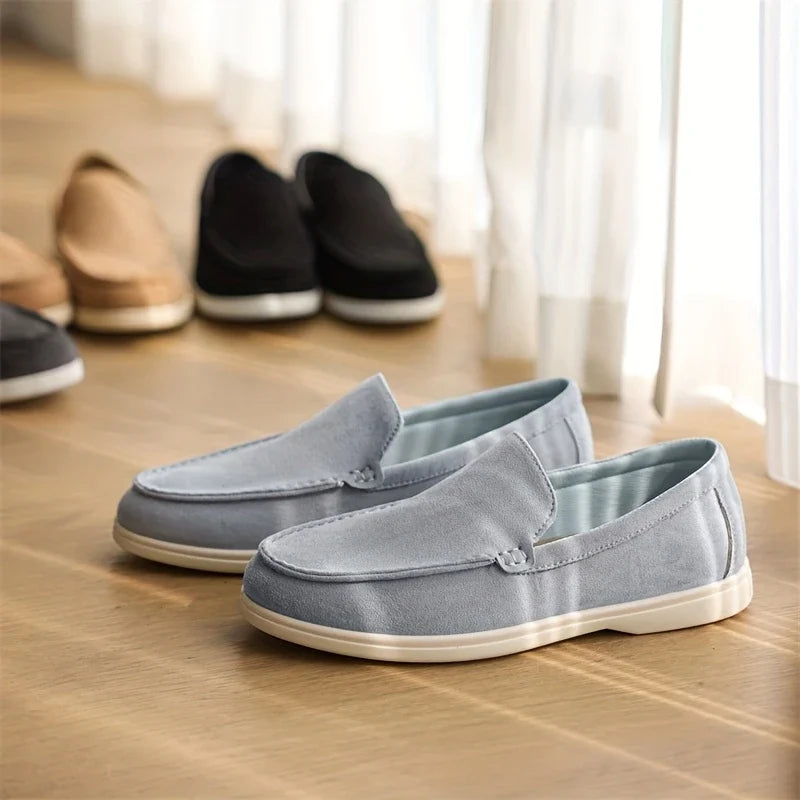 Black men's classic slip-on loafers, comfortable & easy wear for versatile casual and formal-casual outfits.