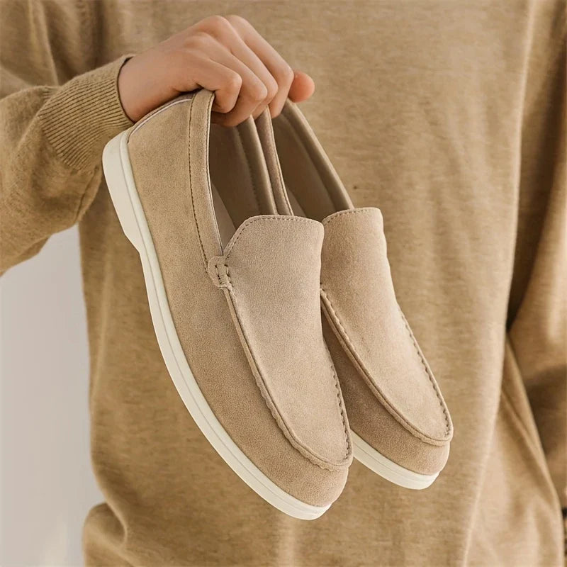 Gray men's classic loafers, comfortable slip-on shoes perfect for casual or smart casual looks.