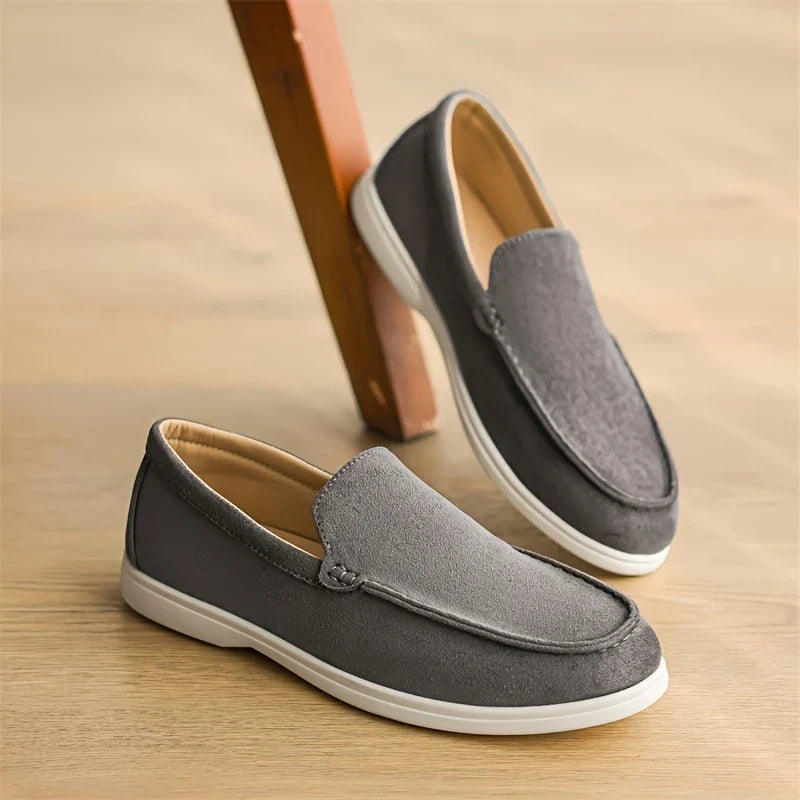 Pair of men's classic slip-on comfort loafers, front view, ready for easy casual wear.