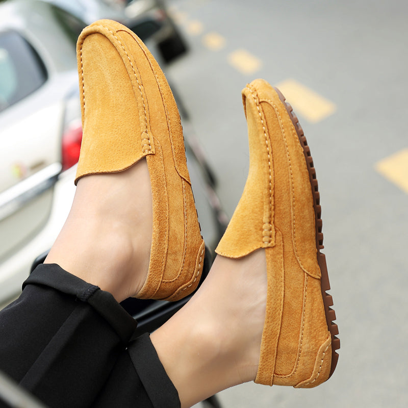Comfortable beige men's loafers, classic slip-on shoes for stylish everyday and casual wear.