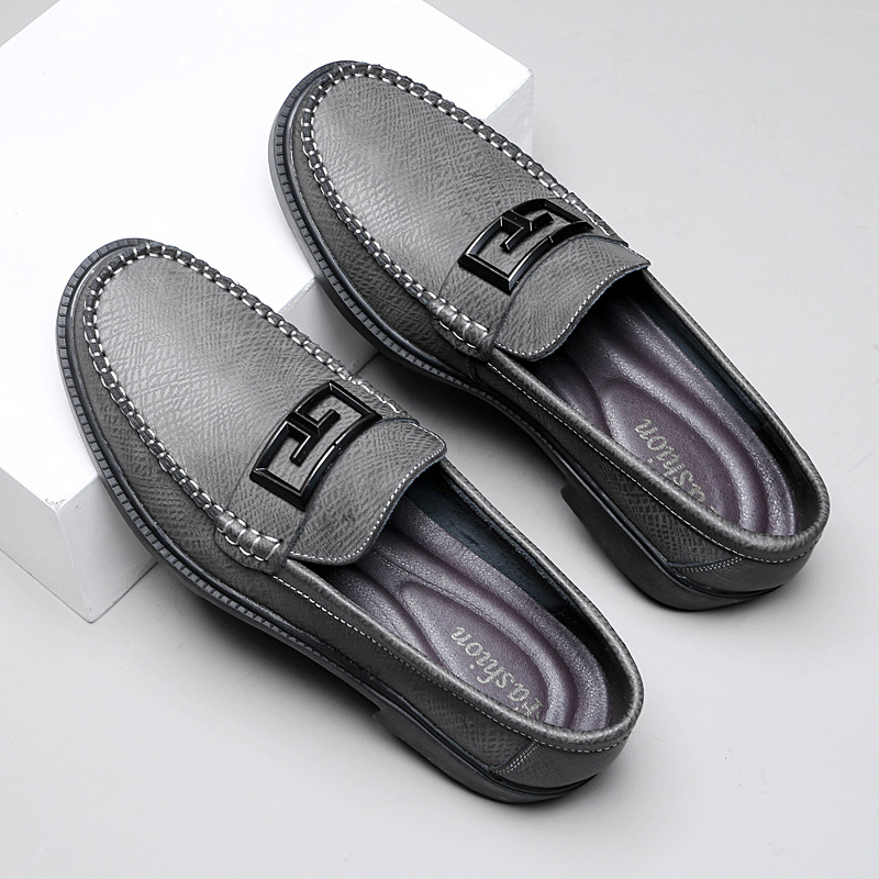 Side profile of classic men's loafers, showcasing their elegant slip-on design and comfortable fit.