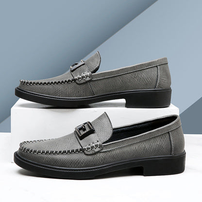 Stylish men's footwear: classic brown slip-on loafers, perfect for both dress and casual outfits.