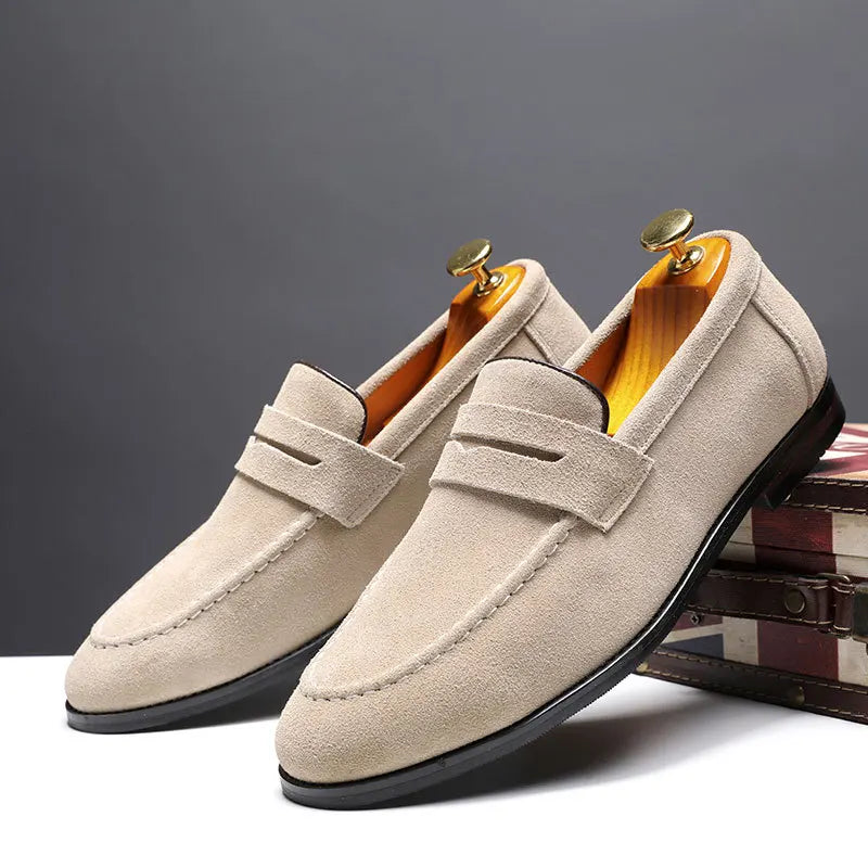 Brown leather-look slip-on loafers for men. Classic, comfortable, and easy to wear for any occasion.