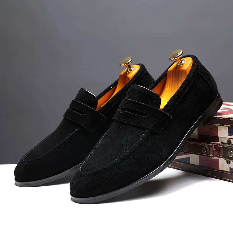Forest green men's loafers, classic slip-on style. Elegant footwear for casual or dressy outfits. Timeless comfort.