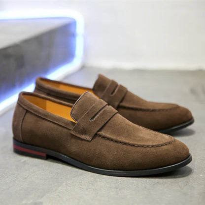 Beige men's slip-on loafers. Refined, classic style for comfortable daily wear. Timeless men's footwear.