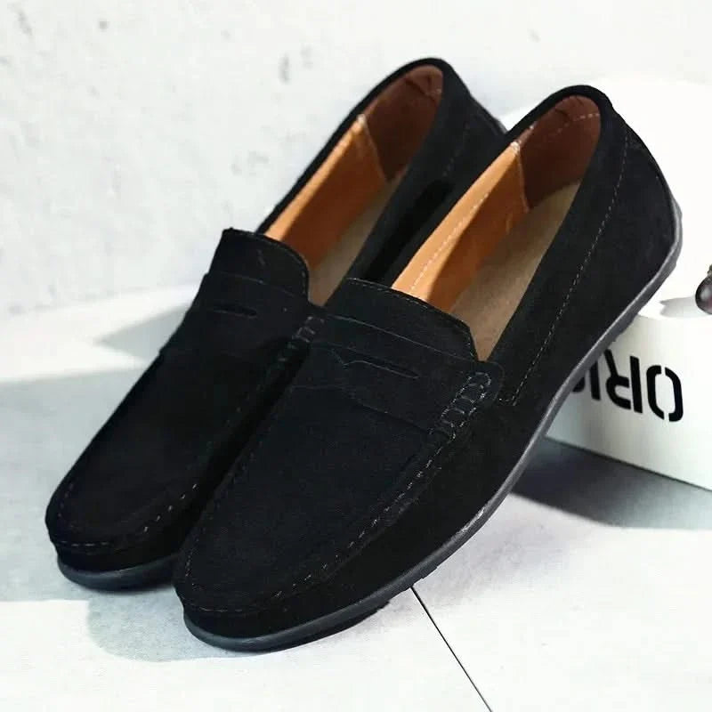 Detail of the durable sole and expert stitching on men's classic slip-on loafers.