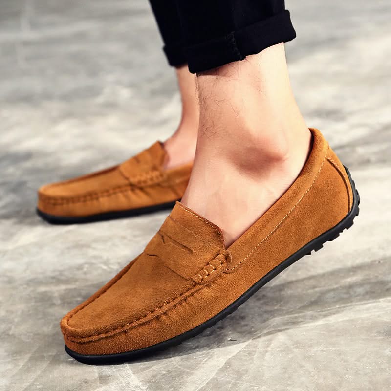 Sleek black men's classic slip-on loafers, offering comfort & durability for any occasion.