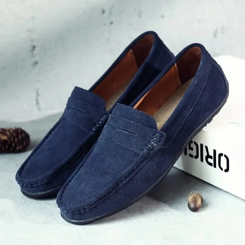 Polished leather men's slip-on loafers, combining timeless style with comfort & durability.