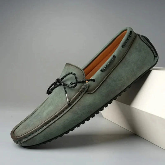 Men's classic slip-on loafers in black, perfect for everyday comfort and versatile casual or smart casual wear.