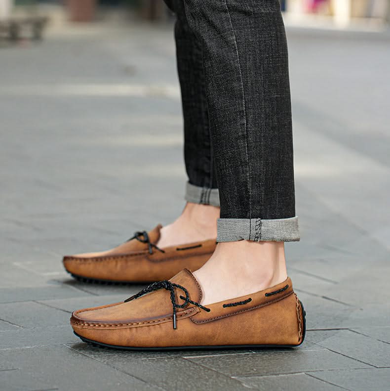 Durable men's slip-on loafers for everyday wear, providing comfort, classic style, and a reliable traction sole.
