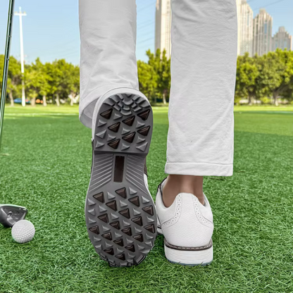 Athletic leather men's golf shoes, spiked for excellent traction, comfortable for long rounds.