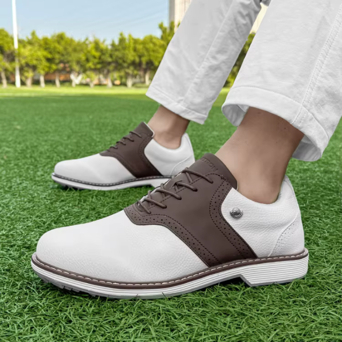 Waterproof leather men's golf shoes, classic design, offering comfort and stability on the course.