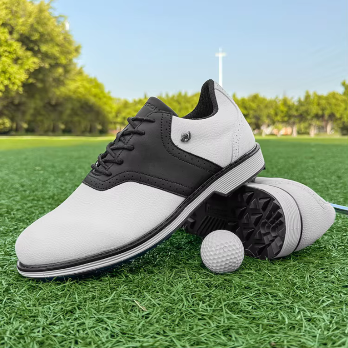 Spiked waterproof men's golf shoes, classic design, athletic build for diverse course conditions.