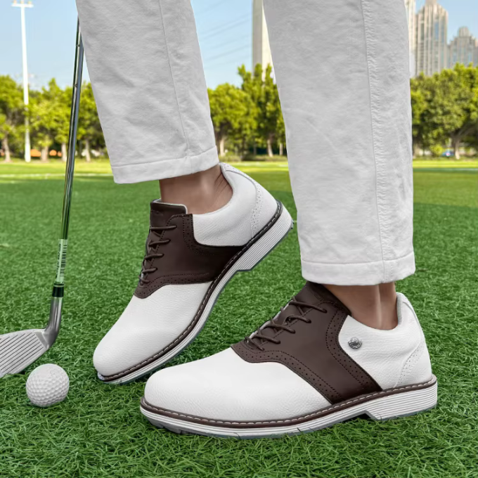 Athletic men's golf footwear with durable spikes, perfect for all weather conditions and grip.