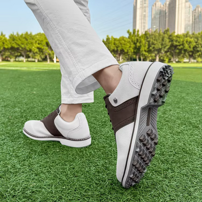 Premium men's golf shoes, waterproof, spiked for optimal traction on any golf course terrain.