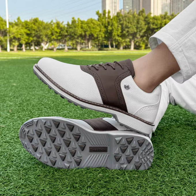 Classic men's leather golf shoes with an all-weather grip, built for comfort and performance.