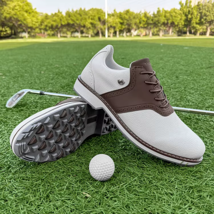 Spiked men's golf shoes for enhanced stability, featuring a waterproof and athletic design.