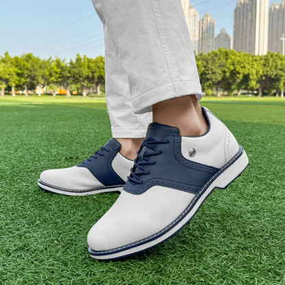 Comfortable men's golf shoes, classic spiked design, waterproof for year-round play.