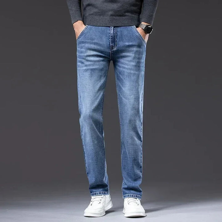 Smoke gray men's straight fit jeans, classic denim style. Comfortable & versatile for casual outfits.