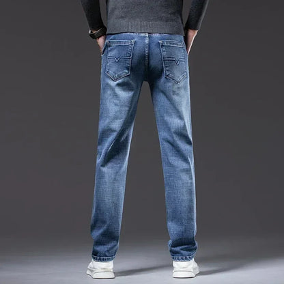 Vintage blue men's straight fit denim jeans, a timeless casual wear essential for men's fashion.
