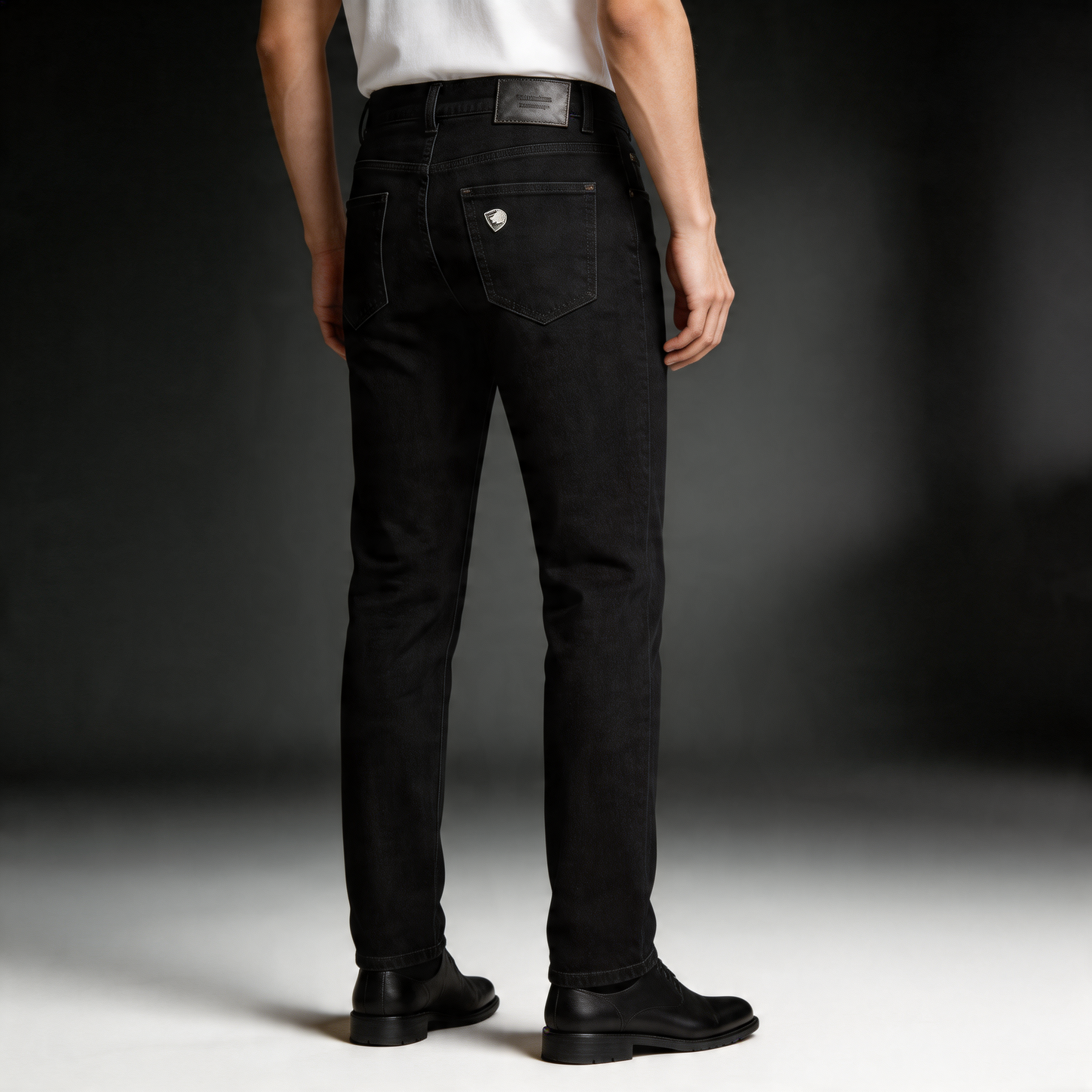 Essential straight leg black denim jeans for men, classic and easygoing menswear.