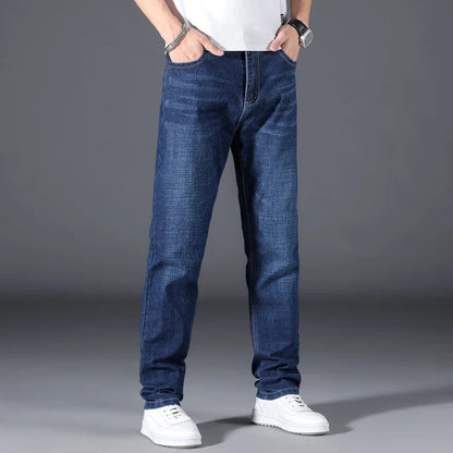 Classic men's straight leg medium wash jeans, relaxed fit, perfect for comfortable everyday style.