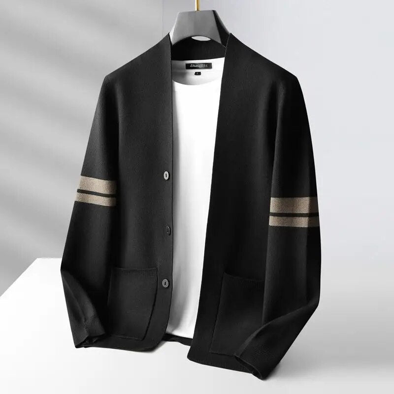 Man wearing a classic striped cardigan sweater, a versatile and comfortable fashion choice for men.