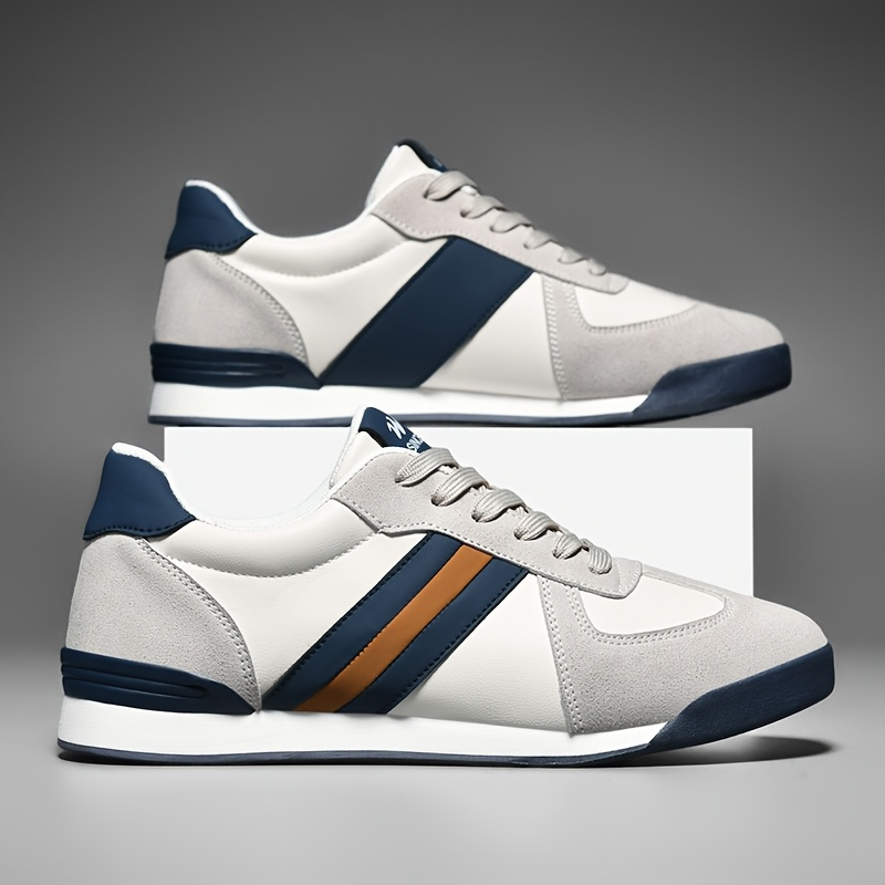 Retro men's athletic striped sneakers, ideal for walking & streetwear.