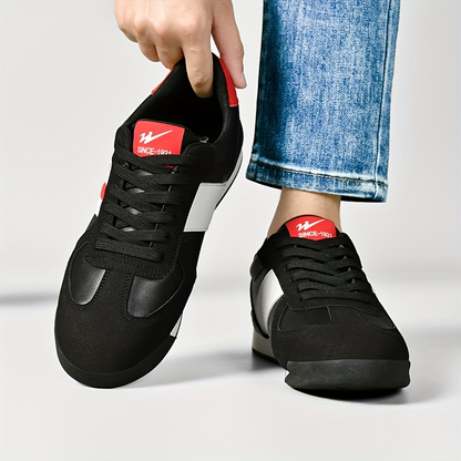 Retro-style men's striped sneakers, offering comfort for casual and athletic footwear.