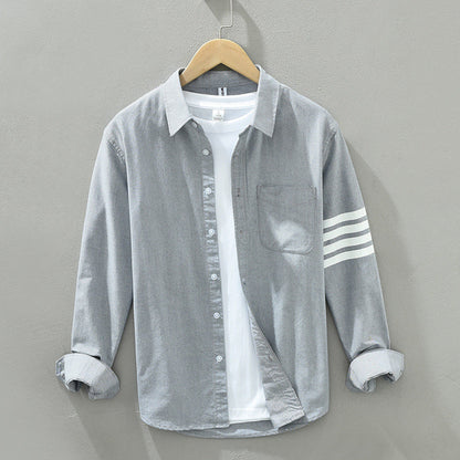 Stylish black long-sleeve striped shirt for men, a classic casual top perfect for smart everyday wear.