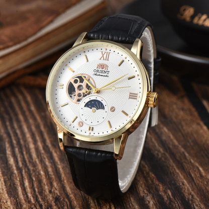 Men's classic automatic leather watch on wrist, featuring Sun & Moon phase, elegant and vintage accessory.