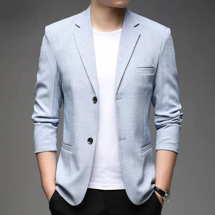 Men's classic tailored navy blazer, perfect for sharp business casual or formal wear. Elevate your style.