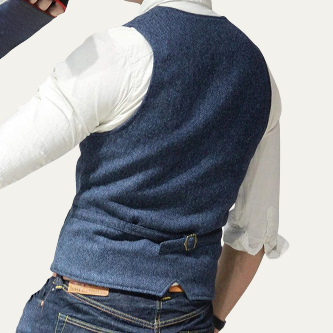 Versatile tailored men's waistcoat. Classic button-up vest for year-round formal or smart casual layered looks.