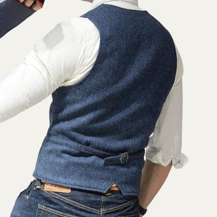 Versatile tailored men's waistcoat. Classic button-up vest for year-round formal or smart casual layered looks.