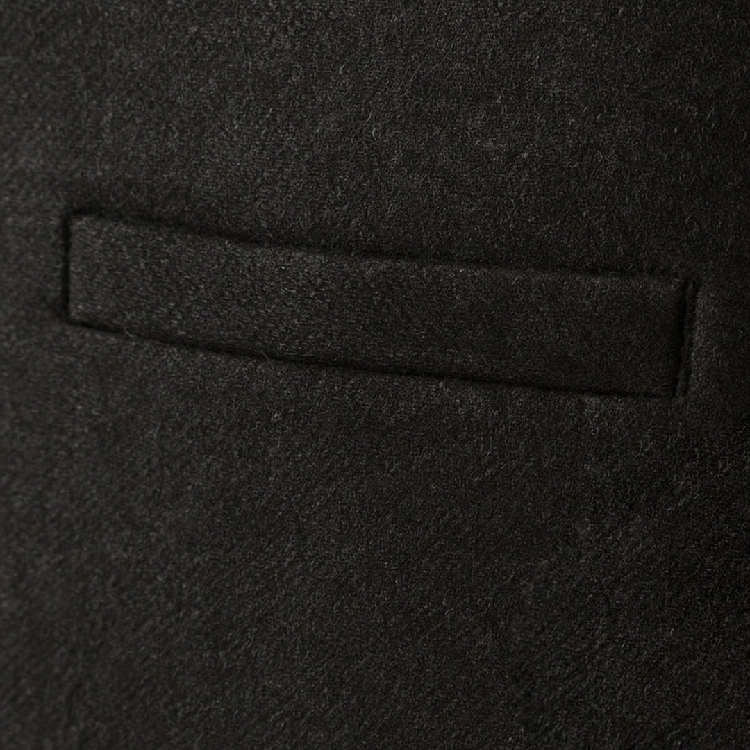 Casual men's vest, tailored for a sharp look. Ideal button-up layered menswear piece for smart-casual outfits.