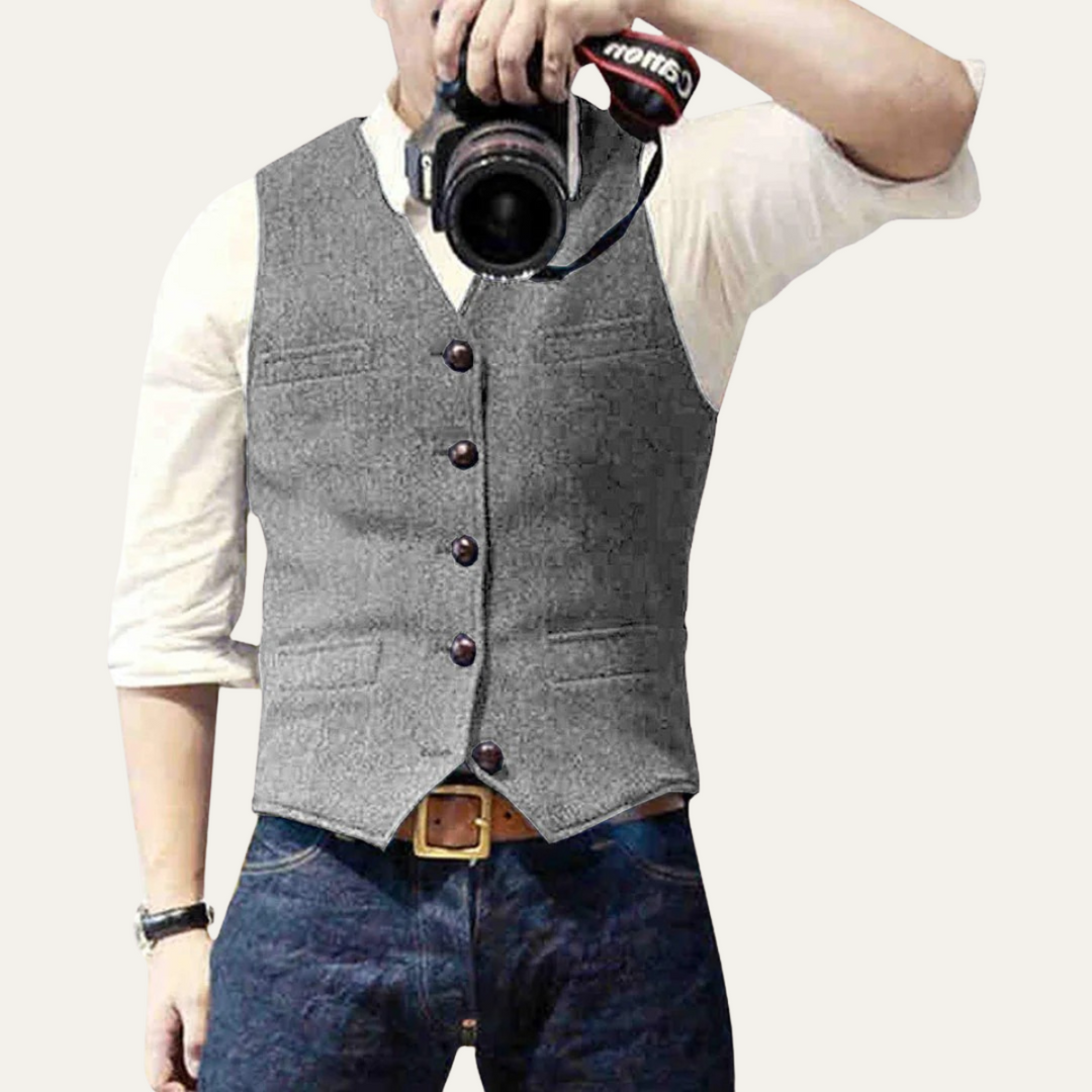 Elegant button-up men's waistcoat. This tailored vest adds a sophisticated touch to any menswear ensemble.