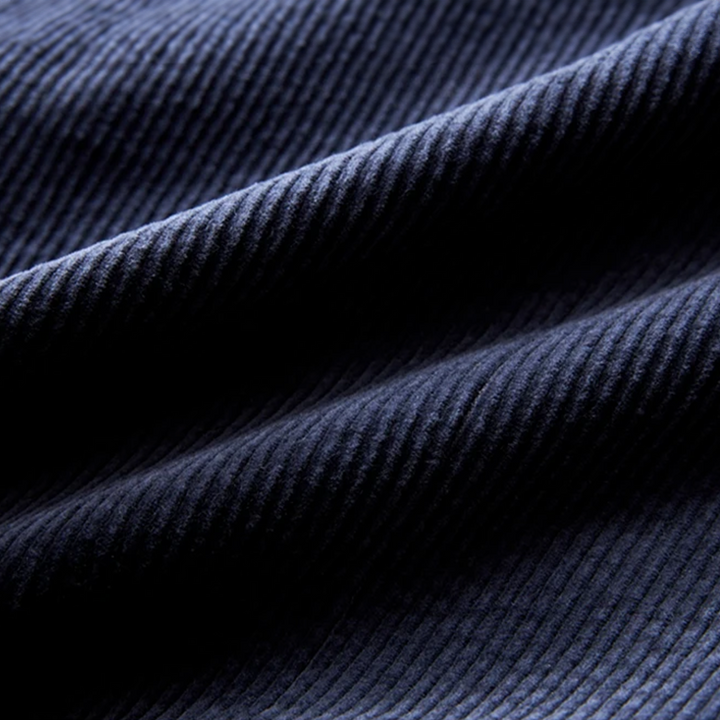 Modern men's textured blazer, perfect for creating a versatile layered look for any smart casual or business ensemble.