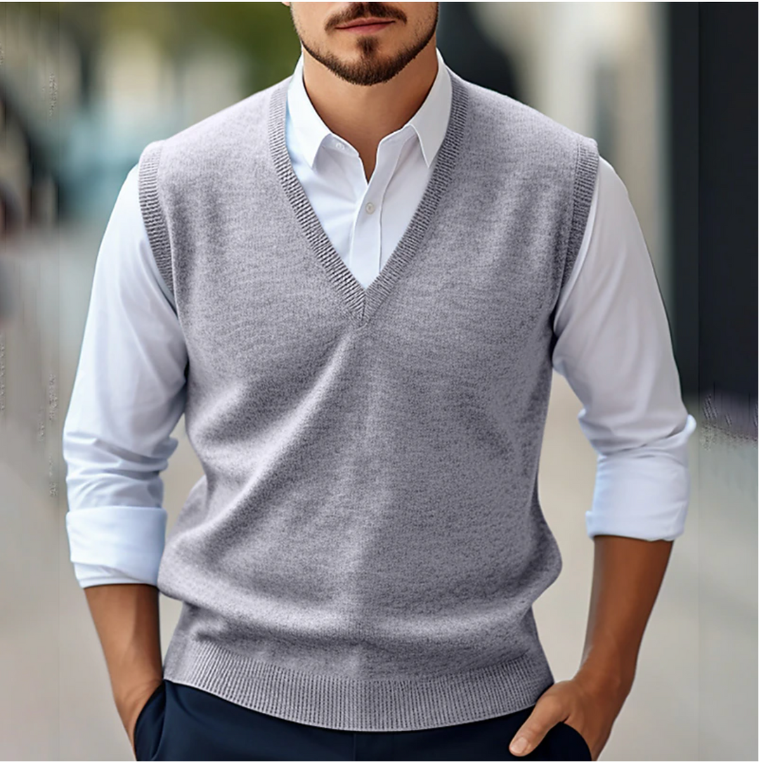 Soft knit men's V-neck sweater vest, a versatile sleeveless piece for a stylish, professional, and polished look.