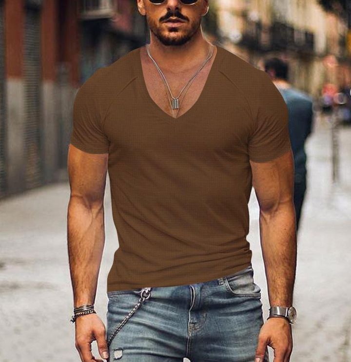 Man wearing a comfortable short-sleeve V-neck t-shirt, showcasing versatile style for casual outfits.