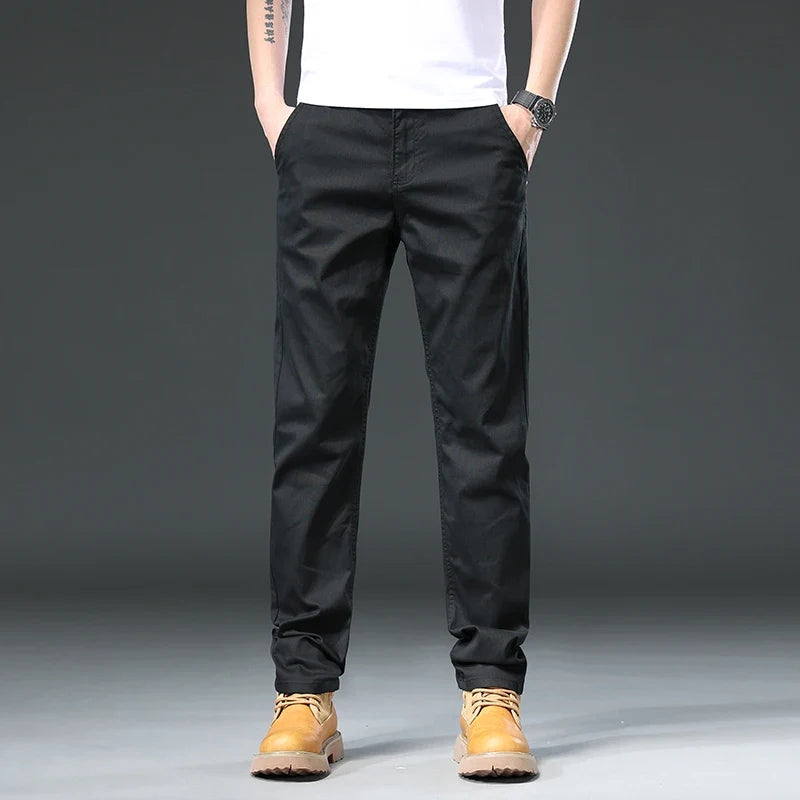 Khaki men's versatile casual pants, ideal for travel and everyday comfort, offering a flexible fit.