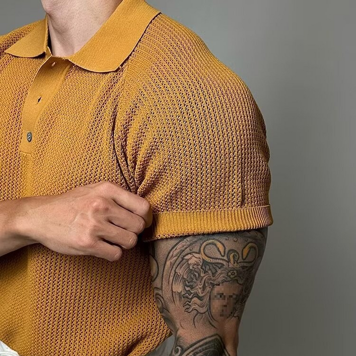 Men's classic waffle polo shirt featuring a firm, structured collar & comfortable short sleeves.