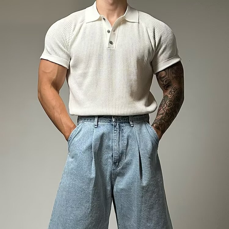 Classic men's waffle polo shirt featuring a stylish structured collar & short sleeves.