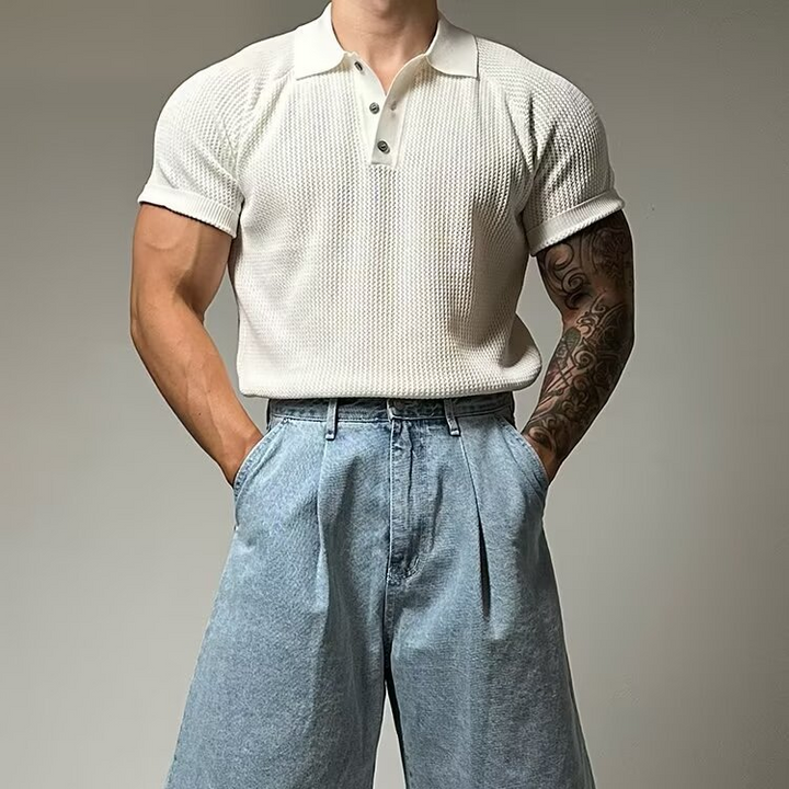 Classic men's waffle polo shirt featuring a stylish structured collar & short sleeves.