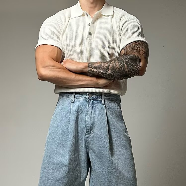 Textured waffle knit men's polo shirt, classic style, short sleeve, perfect for casual wear.
