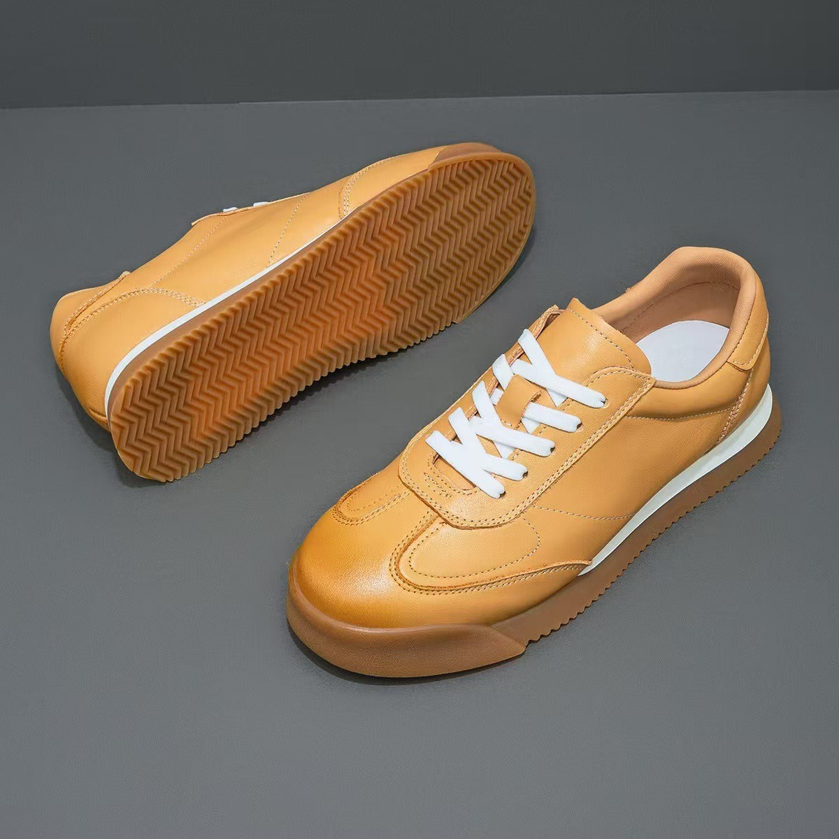 Men's classic genuine leather lifestyle sneakers. Versatile, comfortable, and stylish everyday casual shoes.