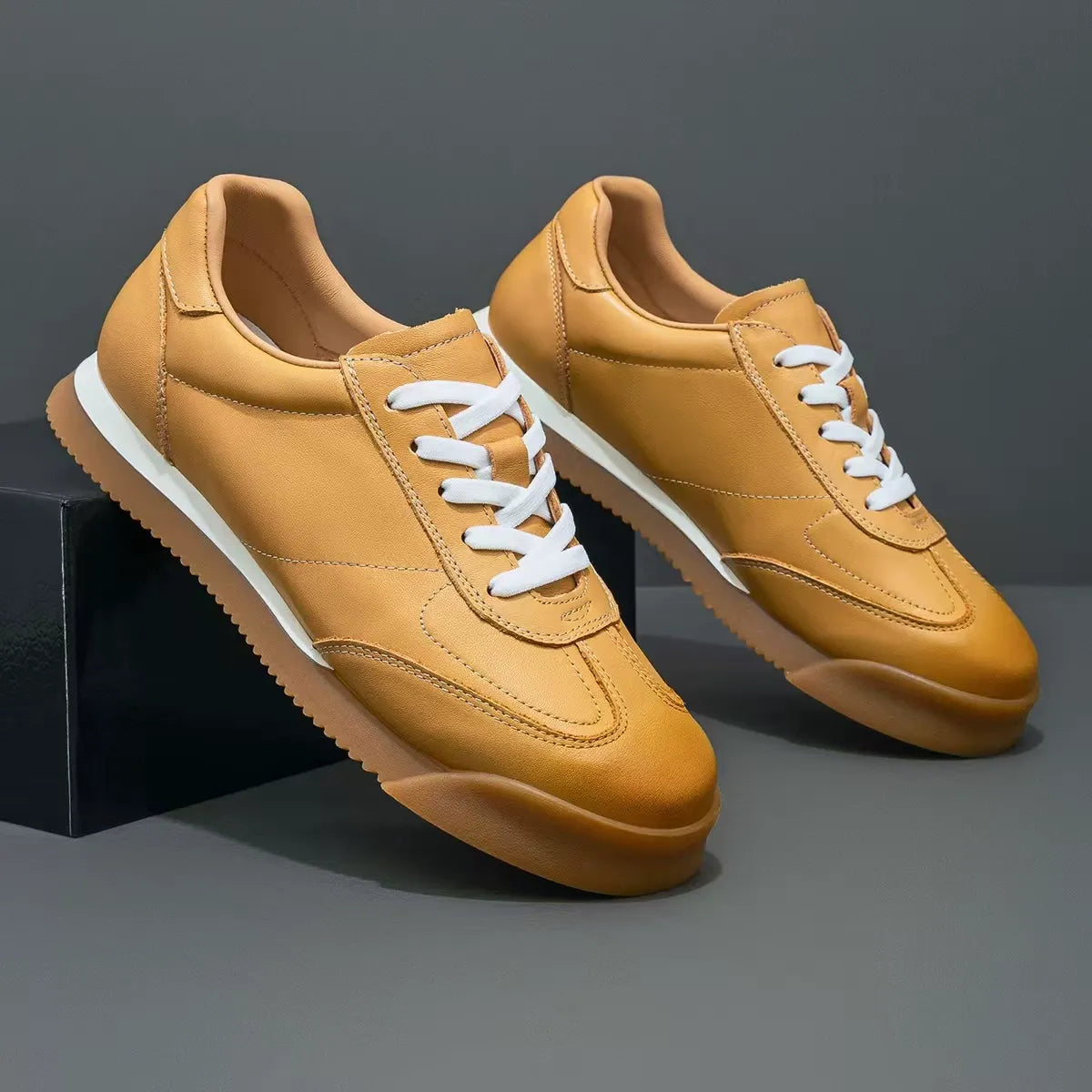 Neutral colored men's classic leather sneakers. Stylish & comfortable everyday lifestyle shoe.
