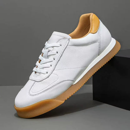 Elegant men's genuine leather dress sneakers. Classic style comfortable lifestyle shoe for everyday.