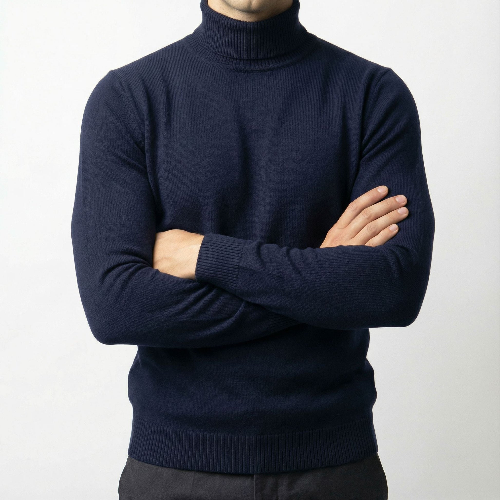 Elegant men's black turtleneck sweater, ideal for cold weather layering. Comfortable classic pullover.