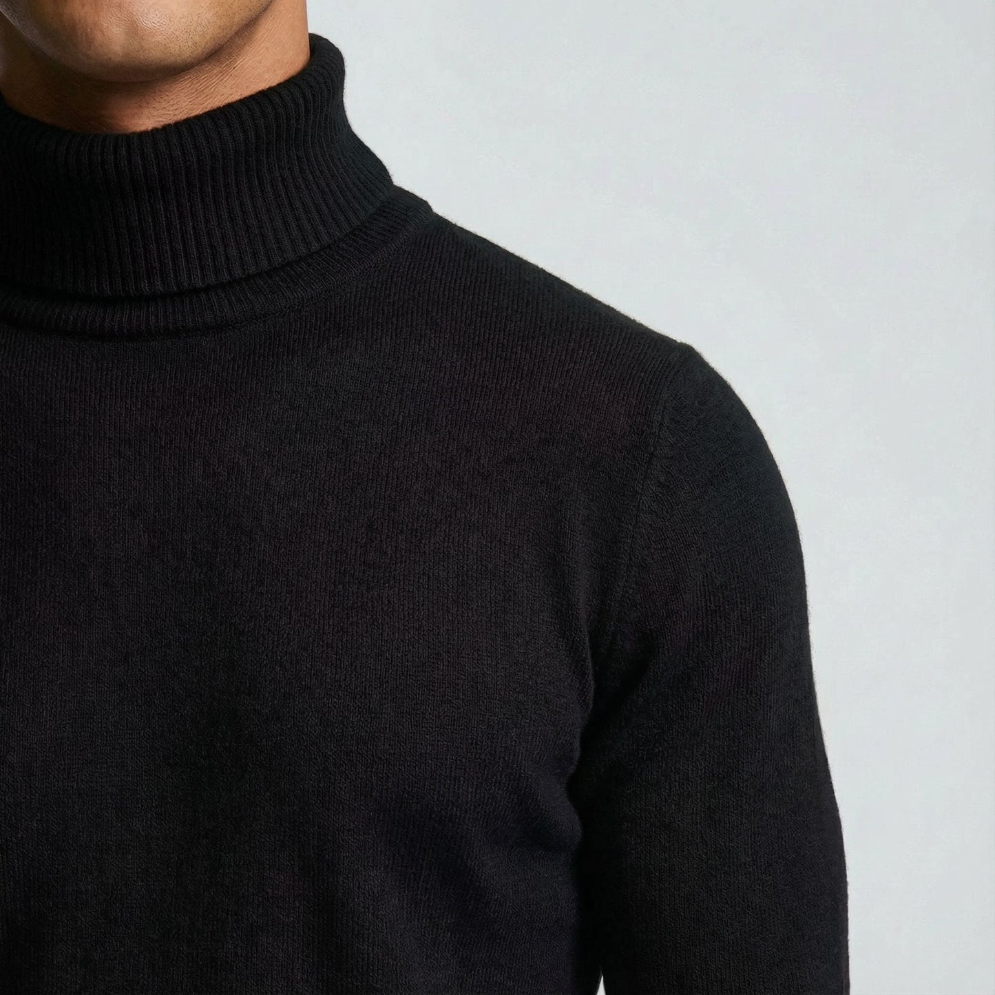 Men's long-sleeve turtleneck pullover, comfortable & elegant for cold weather fashion. A wardrobe essential.