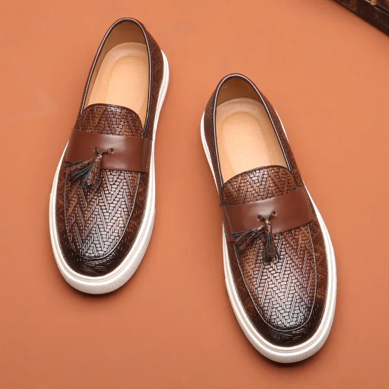 Brown men's woven tassel loafers. Comfortable slip-on dress shoes or casual footwear for a timeless, stylish look.